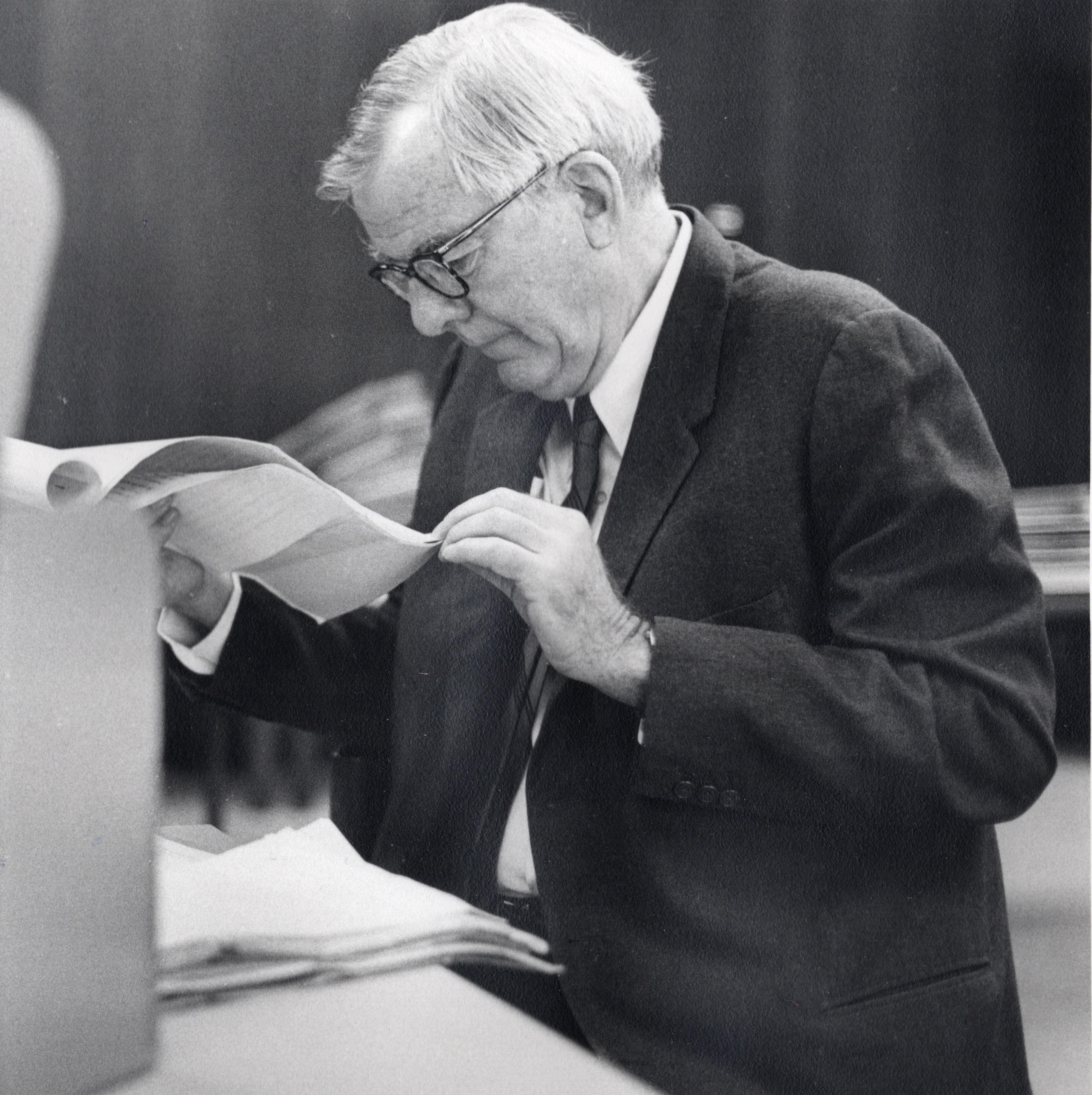 John Dana Archbold reviewing documents, later years